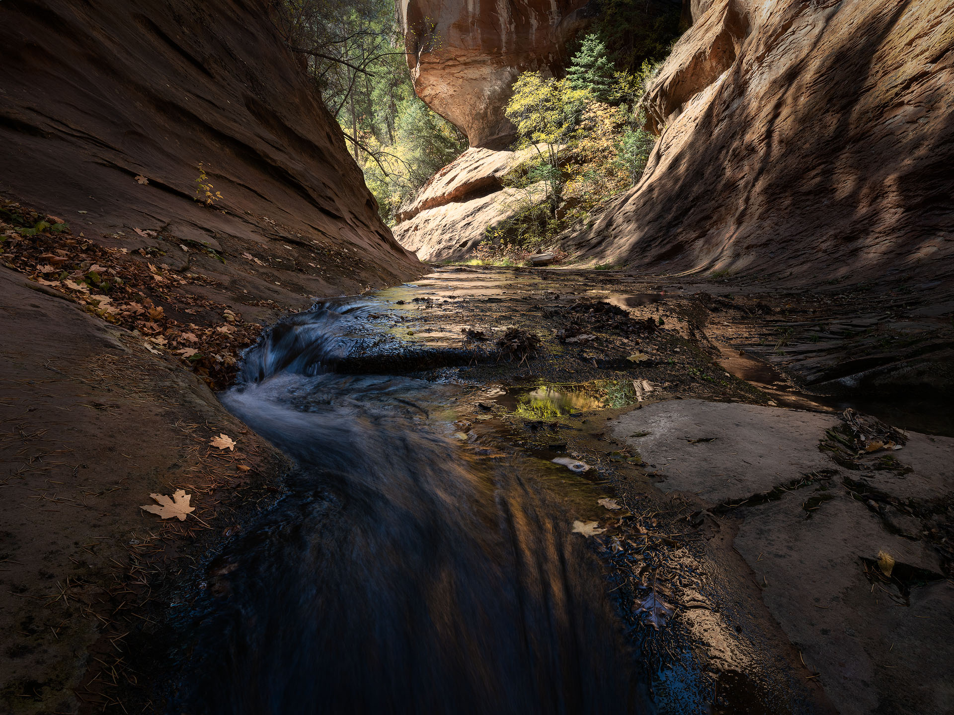 glowing walls-2024-P A glowing river deep in a Sedona canyon