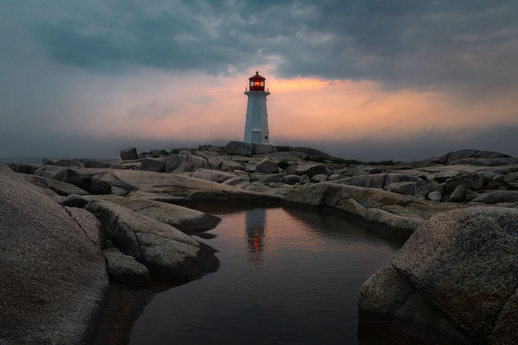 A red glow from Peggy's Cove